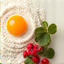 Icon of fresh, organic ingredients like flour, eggs, and fruit.